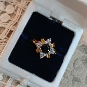 Dark blue sapphire or onyx (could be glass) rhinestone gold plated ring